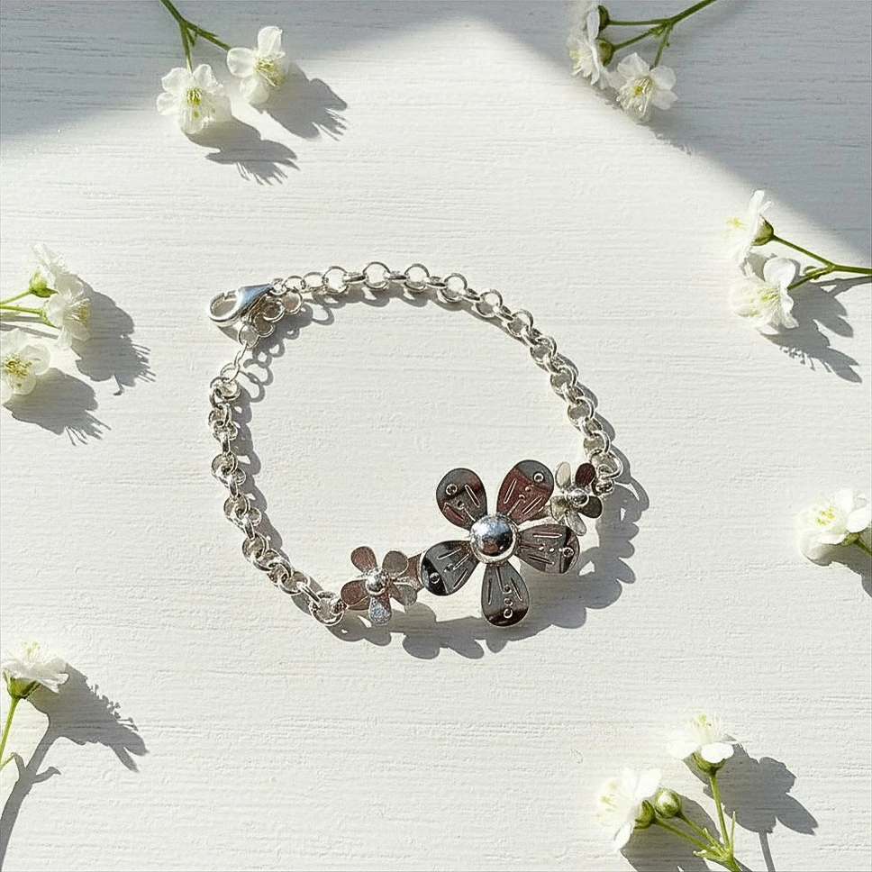 Pulsera flores de plata