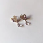 Diseño delicado de aros con amatista y cristales