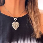 Colgante corazón exclusivo con pirita brillante