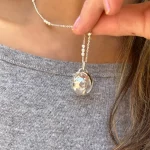Esfera estrellada hecha a mano en plata 950