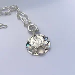 Colgante Padre Pio en plata con piedra natural y cristales Swarovski