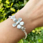 Pulsera Bermuda Grass de plata 950 con diseño floral artesanal
