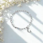 Tobillera de plata hecha a mano con luna y estrella