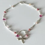 Tobillera artesanal con cristales Swarovski en tonos rosados