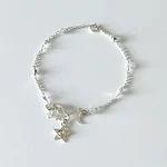 Tobillera con estrellas y luna en plata artesanal