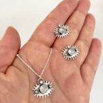 Aros y colgante en forma de ojo con estrella y piedra luna natural