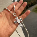 Colgante de plata con técnica envejecida y cristales Swarovski certificados