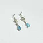 Aros florales en plata con colgante de larimar azul
