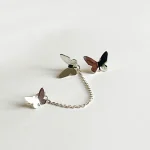 Aros mariposas modernos hechos a mano en plata