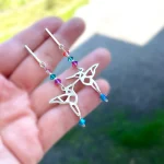 Aros colibrí artesanales con brillo de cristales