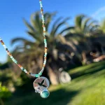 Collar de plata con colibrí calado y amazonita en colgante
