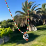 Joya hecha a mano de colibrí con cornalina y mix de piedras