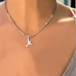 Collar vuelo de colibrí con hilo de algodón y detalles en plata