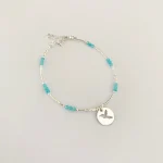 Pulsera de plata con cuarzo cristal y colibrí simbólico