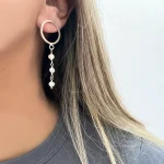 Aros de plata inspirados en el mar con perlas