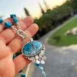 Collar florecer azul con piedra apatita natural y flor en plata