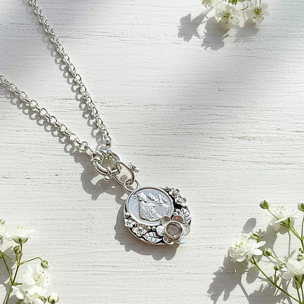 Colgante de plata 950 con flor y piedra natural
