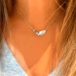 collar de ballena artesanal con estrellas