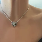 Collar artesanal con pirita dorada y corazón tallado