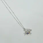 colgante cangrejo con cristal brillante