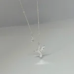 collar artesanal de colibrí y cadena de plata