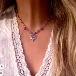 Joya artesanal con amatistas naturales y cristales Swarovski