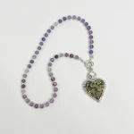 colgante artesanal de plata con pirita y luna calada