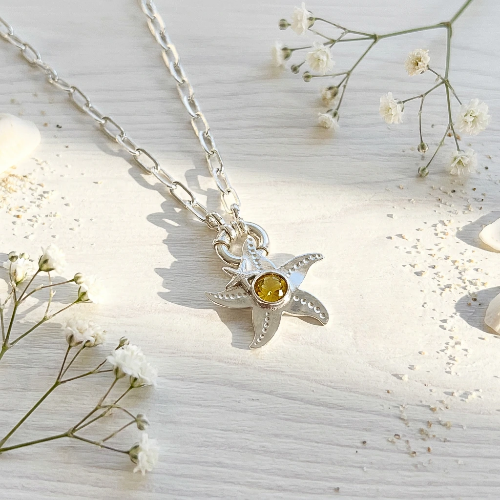 Colgante estrella de plata 950