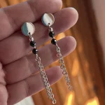 Aros artesanales ligeros con detalles de plata