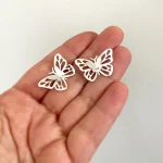 Aros artesanales con doble mariposa en plata