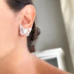 Aros calados con diseño de mariposas en plata 950