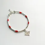 Pulsera simbólica de protección con coral natural
