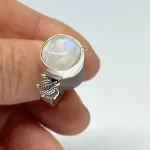 anillo de plata con tortuga y estrella de mar