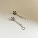 aros flor artesanales con cuarzo cristal