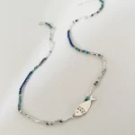 collar hecho a mano con colgante pez