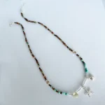 collar con estrella de mar y conchita