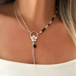 joya artesanal con onix y cristal swarovski