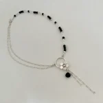 colgante flor de plata con onix natural