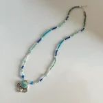 collar larimar flor azul hecho a mano
