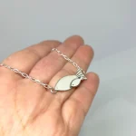 collar de peces calados a mano