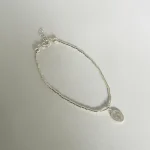 pulsera religiosa artesanal en plata