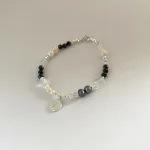 pulsera con onix perlas y cuarzo cristal