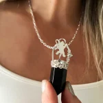 joya artesanal con piedra ónix