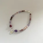 pulsera artesanal con san expedito y piedras naturales