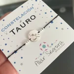 pulsera hilo negro medalla signo