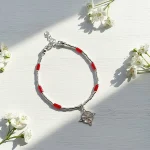 Pulsera nudo mostacillas con coral natural y plata