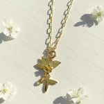 Colgante colibrí hibiscus doré en plata 950 enchapado en oro 18k