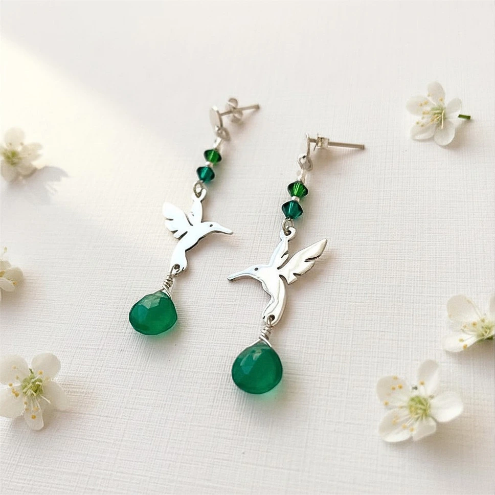 Aros colibrí de plata 950
