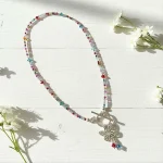 Collar con flor alas de ensueño