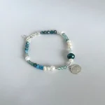 Pulsera de piedras naturales con simbolismo religioso y plata 950 - Pilar Segura Orfebre Chile